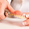 ремонт зубных протезов